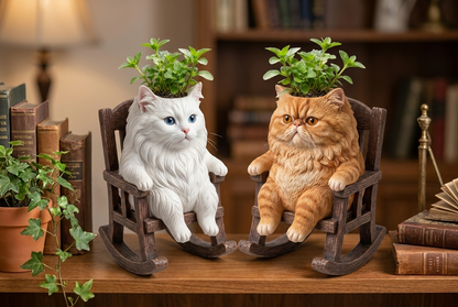 Cat rocking planters styled on a bookshelf