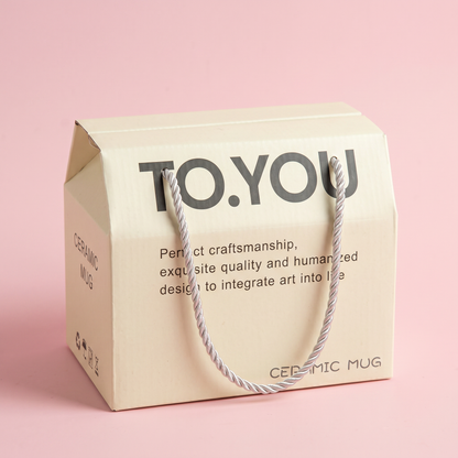 TO.YOU pastel-pink branded gift box