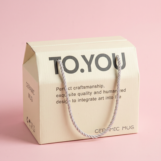 TO.YOU branded pastel pink gift box